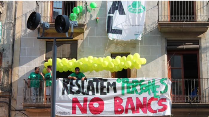 Demonstration banners between balconies on a flat buliding