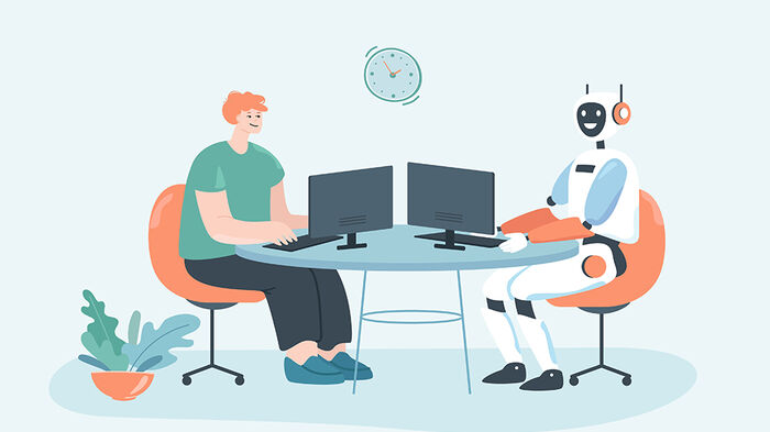 Illustrasjon viser en mann og en robot som sitter og jobber med pc-er p? et delt kontorbord