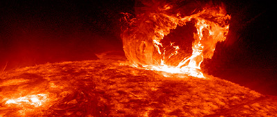 Image of the surface of the sun in red and yellow