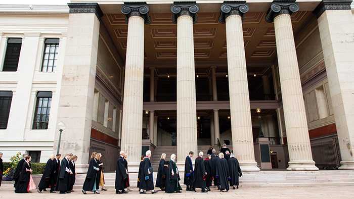 Procession of deans and honorary doctors outside the University Aula.