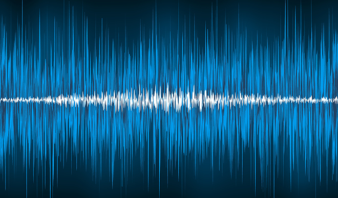 Blue and white sound waves on black background