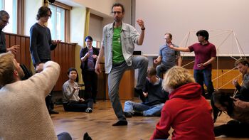 One of the workshop&#39;s goals was to explore how rhythms can be triggered in the body. Andrzej Molenda (Copernicus Hall of Science, Warsaw) led a session on connections between body movement and psychological states.