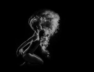 Lady in black and white with smoke